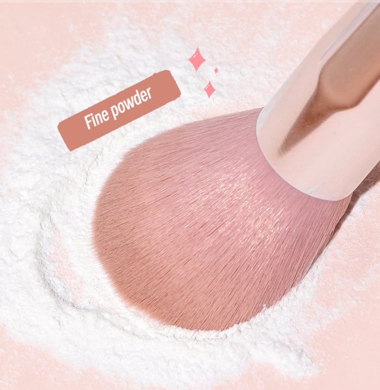 Application of GOGOTALES Setting Loose Powder, showing powder on the puff and a swatch on an arm with a soft focus effect.